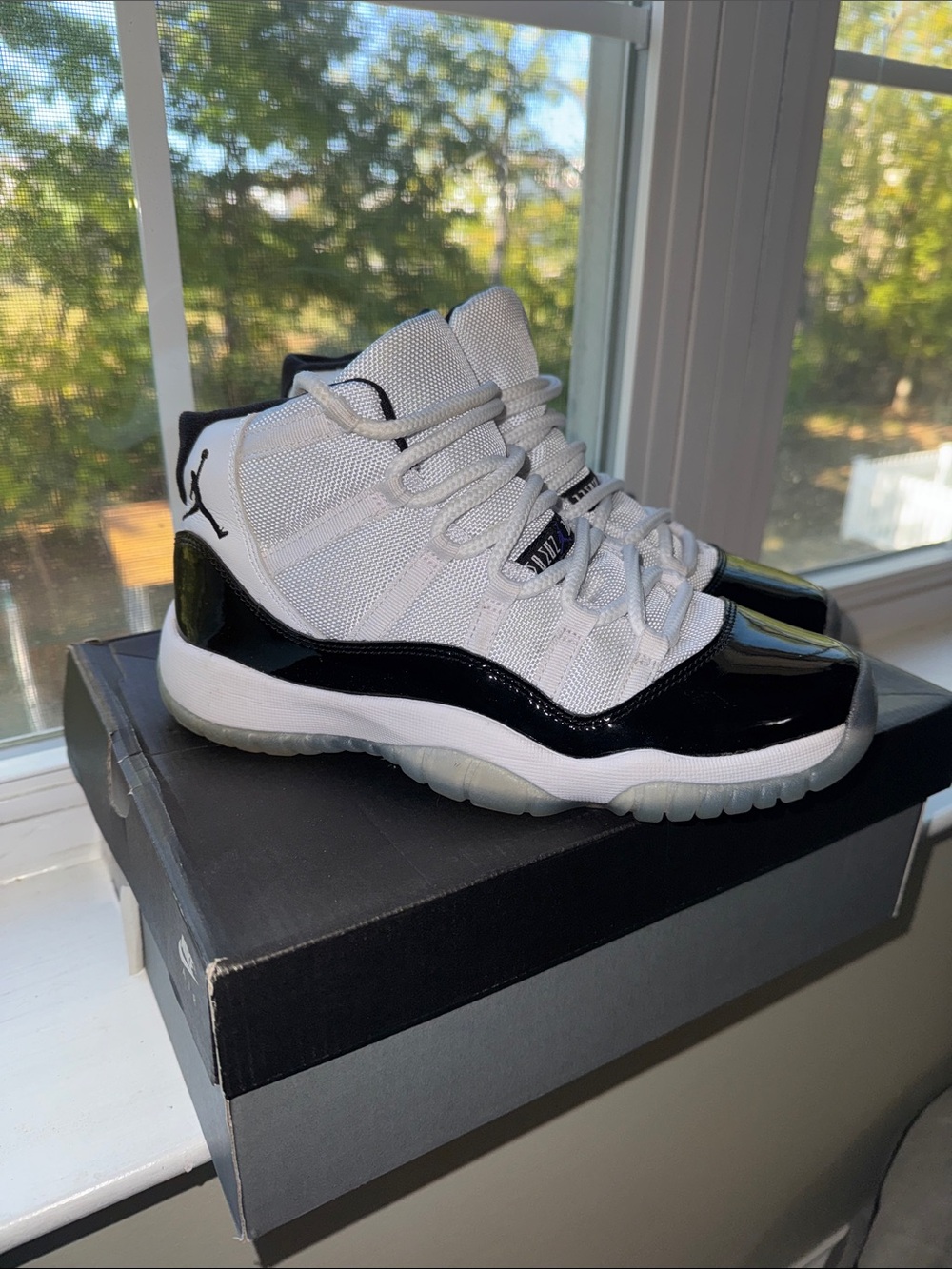 Jordan 11 Kids White and Black High-Top Sneakers